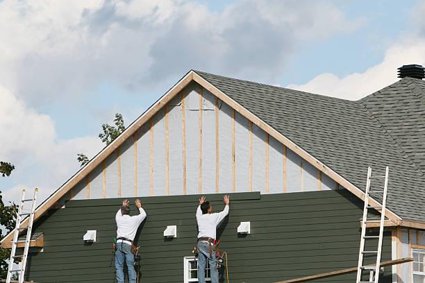 Professional Siding Contractor technician working in Centerport, NY